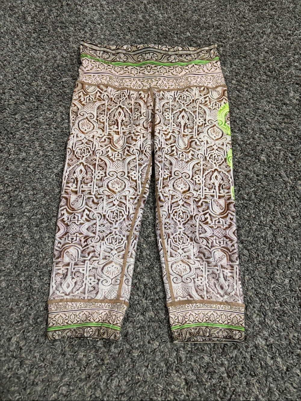 Niyama Sol Leggings cream-and-brown architectural print bright neon green accent
